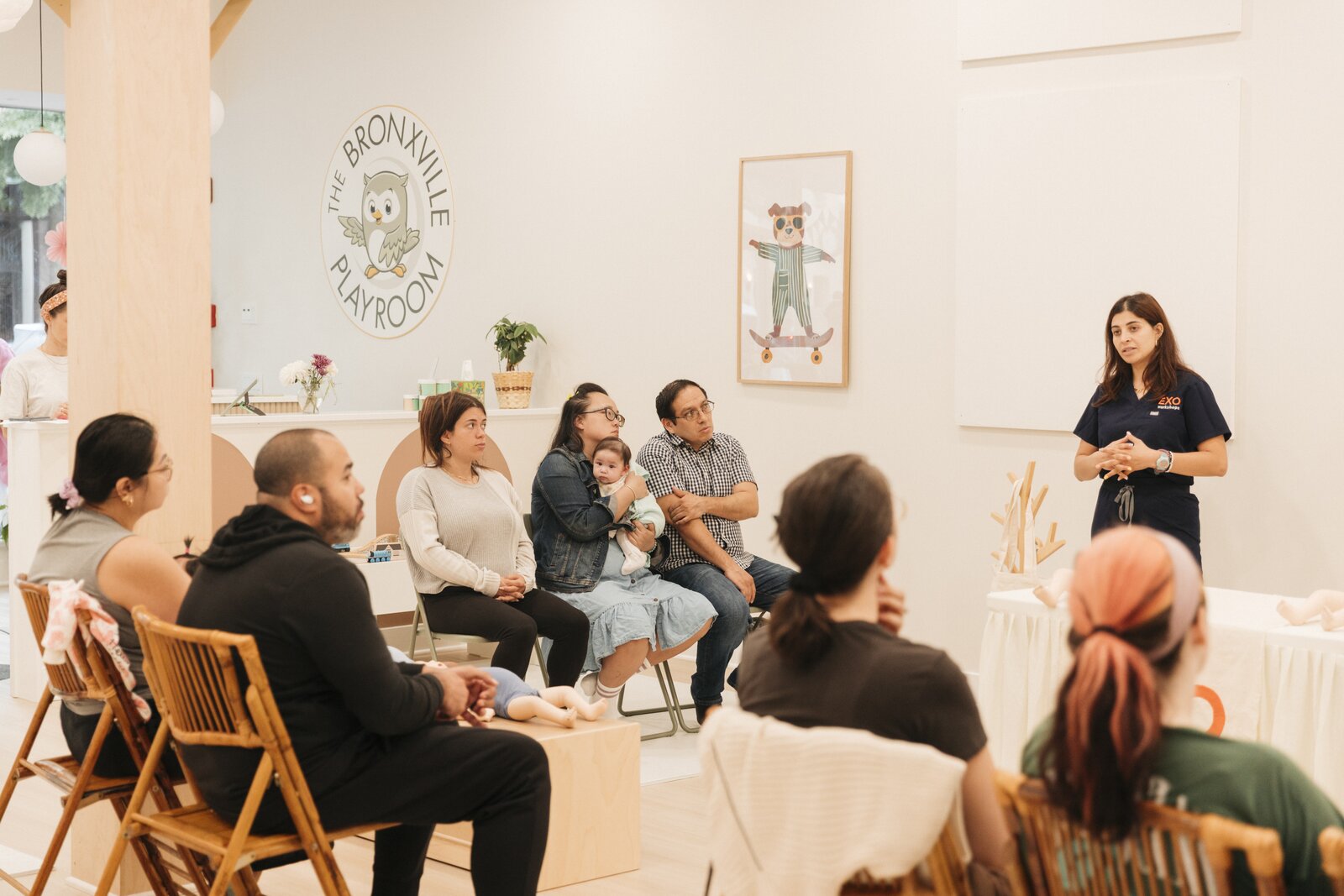 EXO instructor leading a group workshop for parents and babies